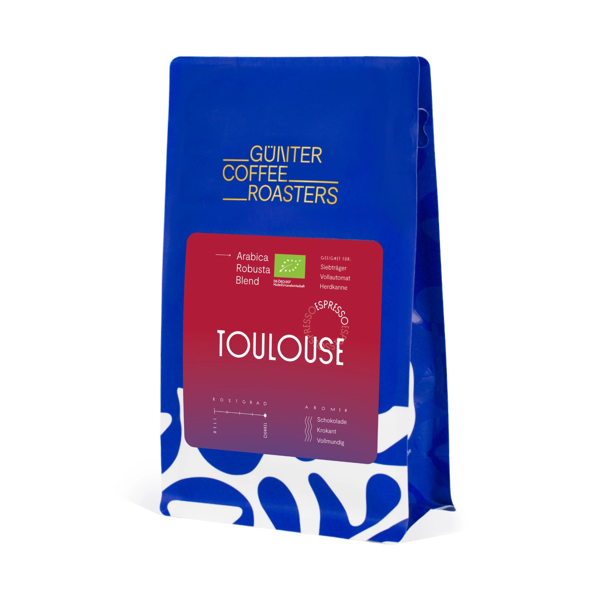 Produktverpackung Toulouse Bio-Kaffeebohnen aus Ruanda für die Zubereitung als Espresso. Noten von Schokolade und Krokant, vollmundig im Geschmack. Röstgrad 5 von 5. Arabica-Robusta-Blend mit Rohkaffees aus Indien, Brasilien und Guatemala.
