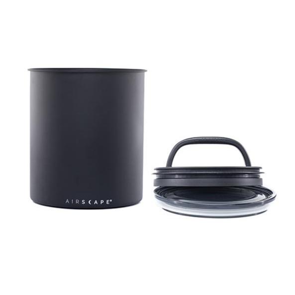 Airscape Aromadose in schwarz für 500 g Kaffee mit danebenliegendem Schließmechanismus, bestehend aus Vakuumventil und Deckel.