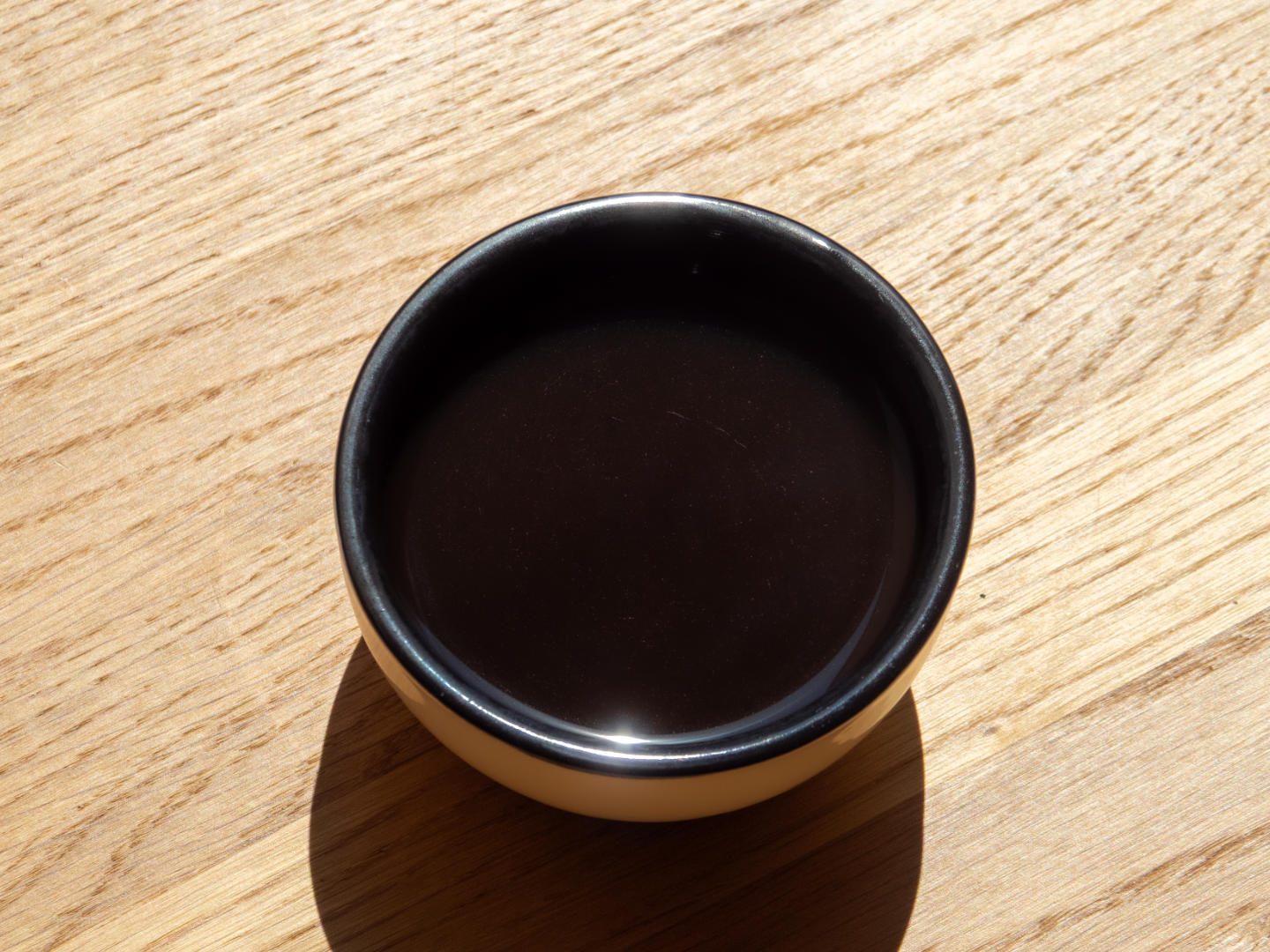 Titelbild Cup of Excellence mit Cuppingbecher