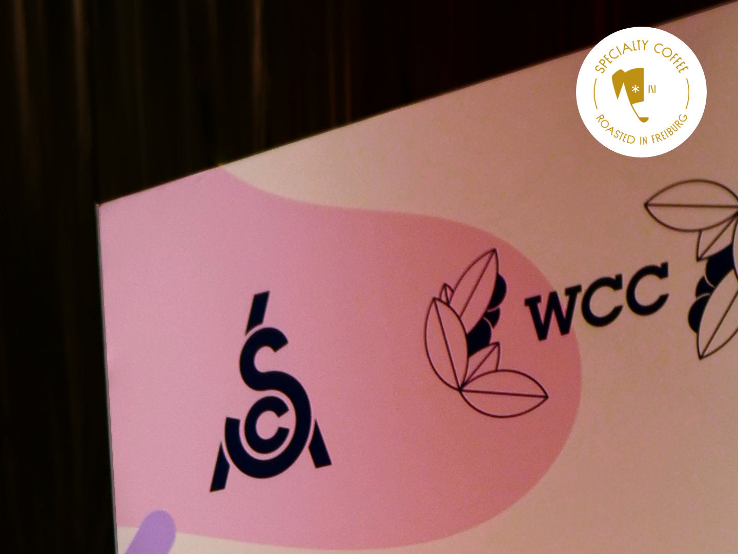 Specialty Coffee Association Logo und WCC-Logo in Chicago auf der Specialty Coffee Expo.