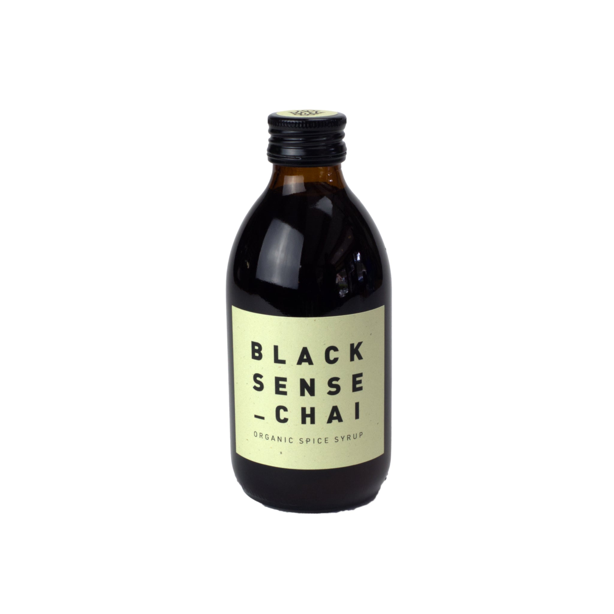 Black Sense Chai Flasche in 250 ml. Braune Flasche mit hellgelbem Etikett.